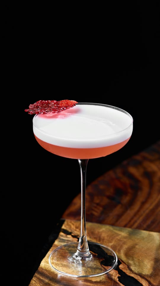 The original stock photo: a Clover Club cocktail on a dark bar